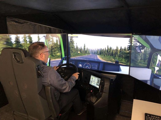 Operator using a driver training simulator